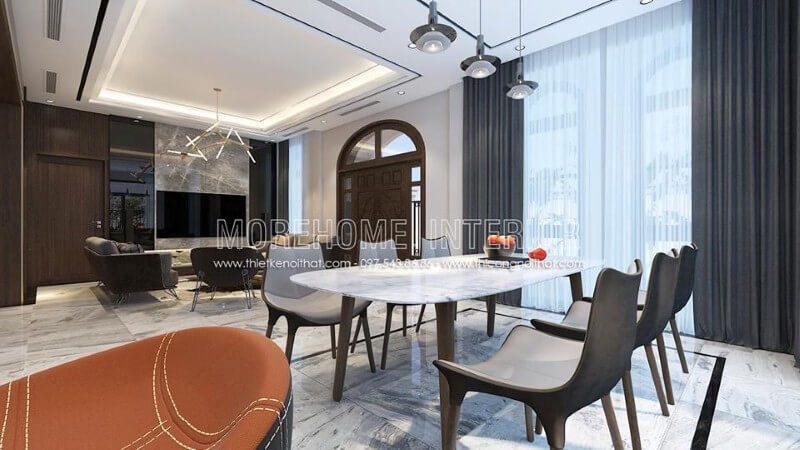 Thiết kế nội thất phòng ăn biệt thự hiện đại gần kề với khu vực phòng khách sẽ giúp gia chủ tiết kiệm thời gian và dễ dàng trong việc dùng bữa và tiếp khách đến chơi nhà.